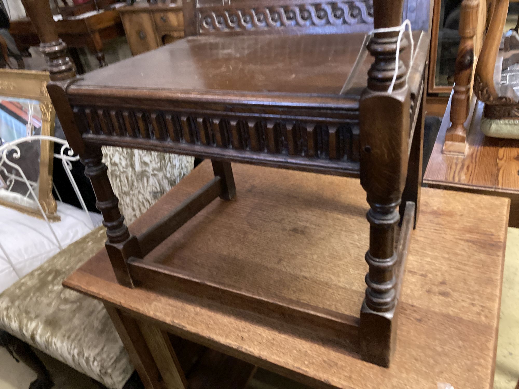 An 18th century style oak wainscot type elbow chair, width 58cm, depth 45cm, height 89cm